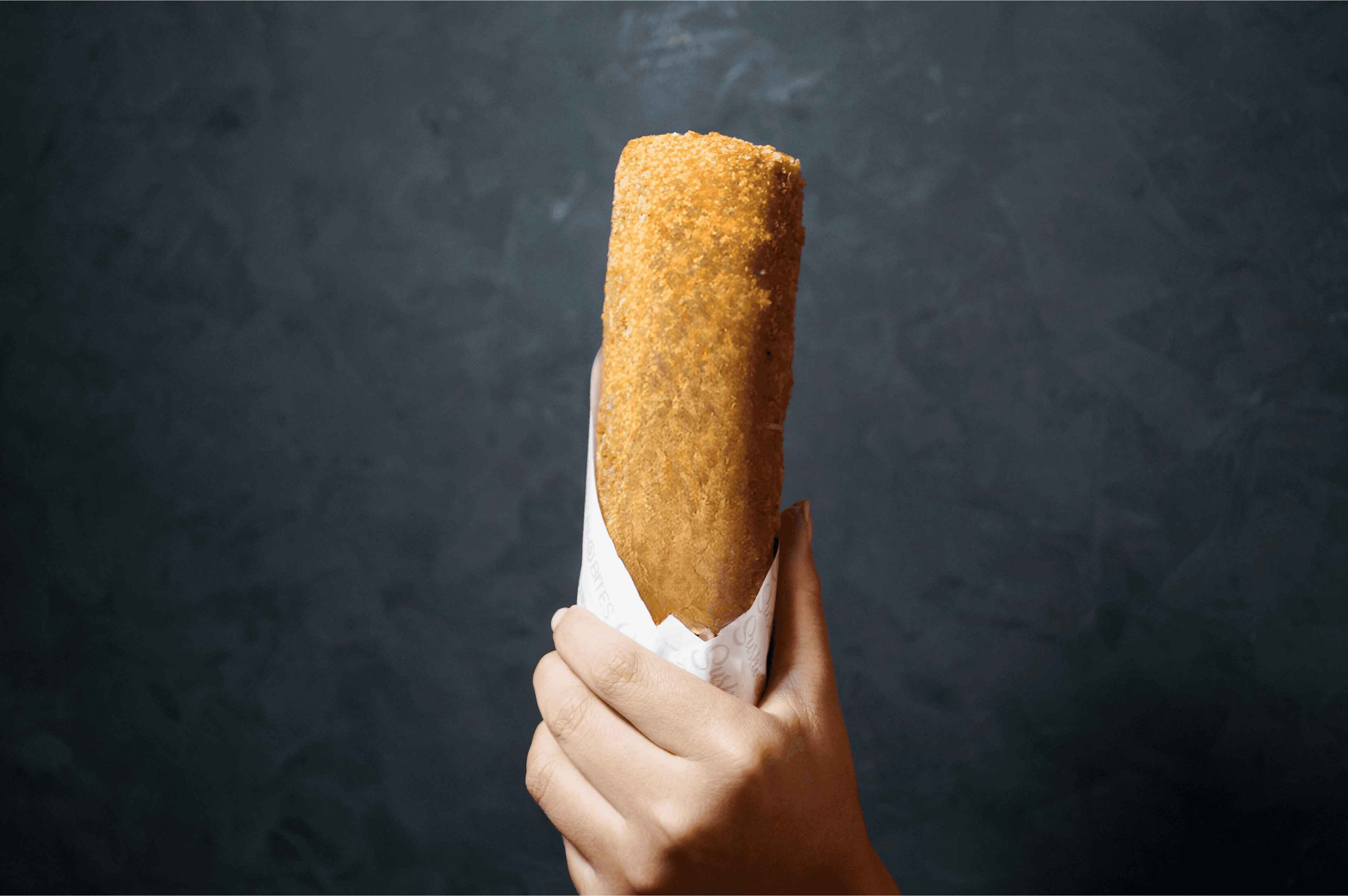 Crispy fried ground beef and bacon sushi handroll by Sushi Bites