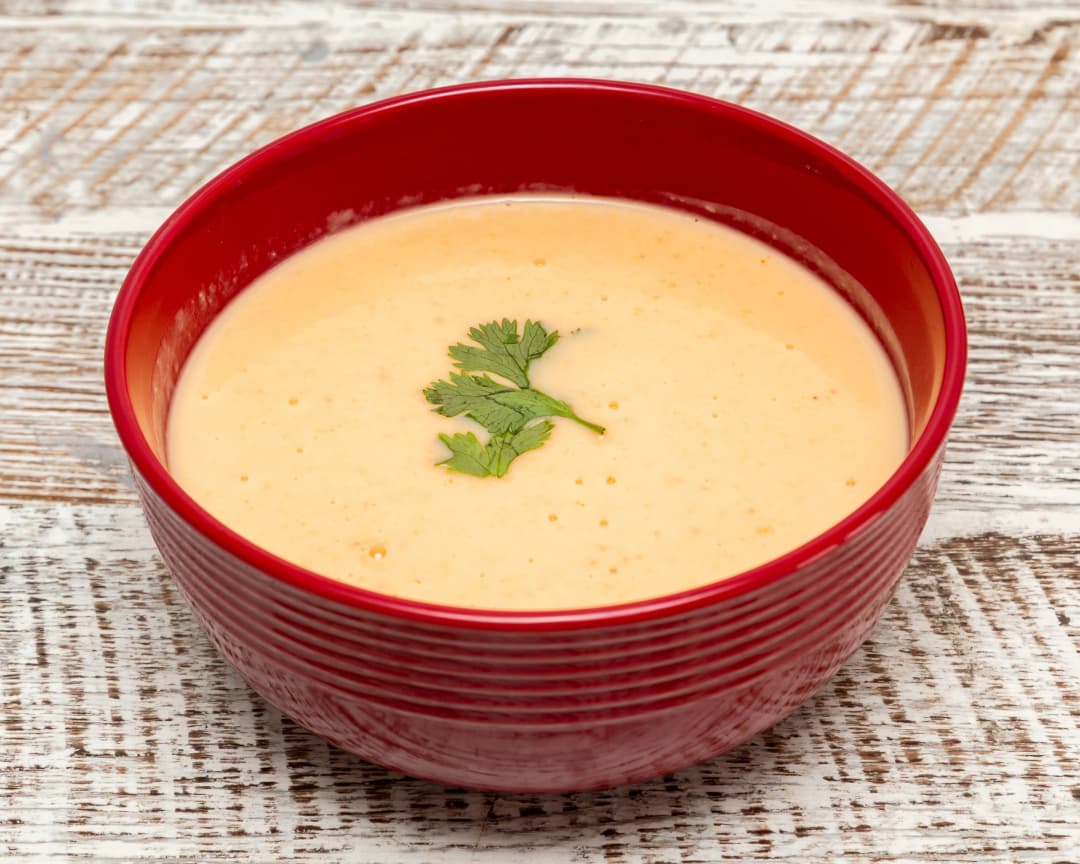 Creamy lobster soup simmered to perfection with shredded sweet potato. A warm, savory comfort dish with a bold seafood flavor, served Sushi Bites style.