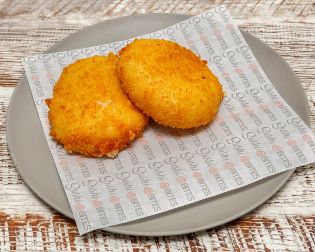 Golden fried yuca blended with rich cheese, crispy on the outside and gooey inside. A Bolivian comfort snack reimagined in Japanese style.