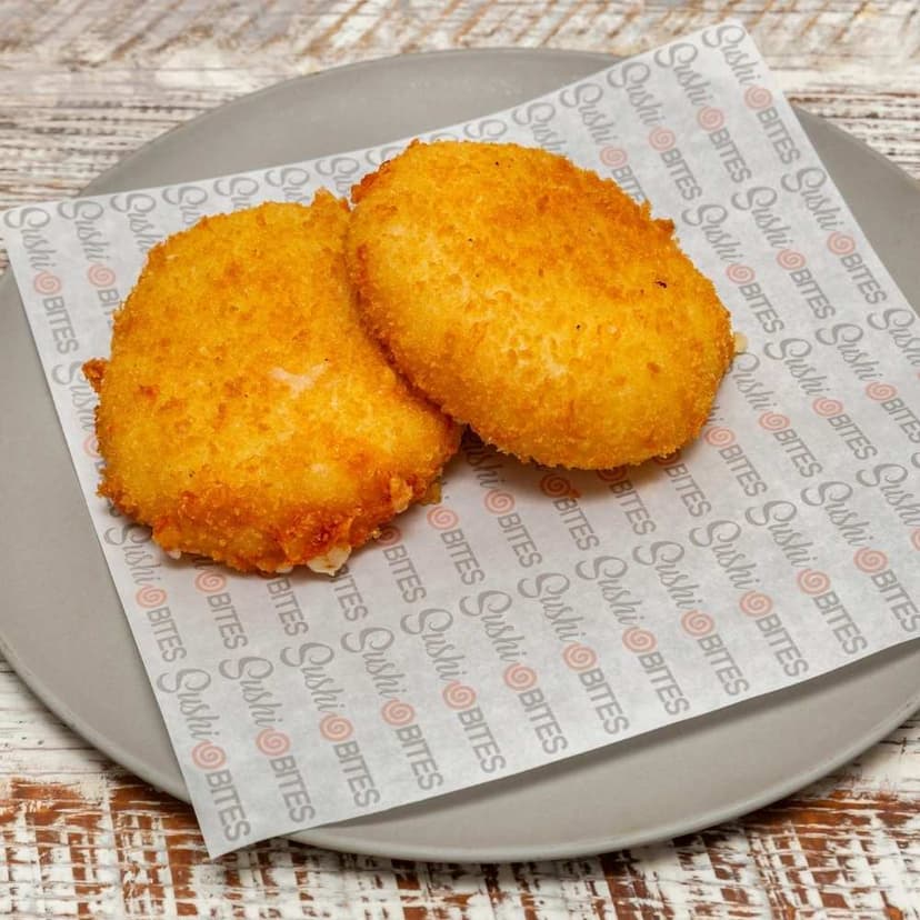 Golden fried yuca blended with rich cheese, crispy on the outside and gooey inside. A Bolivian comfort snack reimagined in Japanese style.