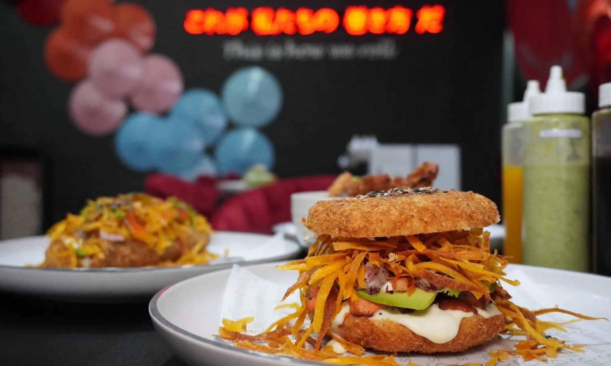 Fried Sushi Burger in Tampa at Sushi Bites, crispy rice buns with salmon, shrimp, squid, sweet potato and cream cheese — best fried sushi in Tampa, always cooked